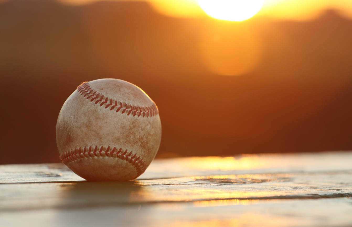 Baseball in sunset